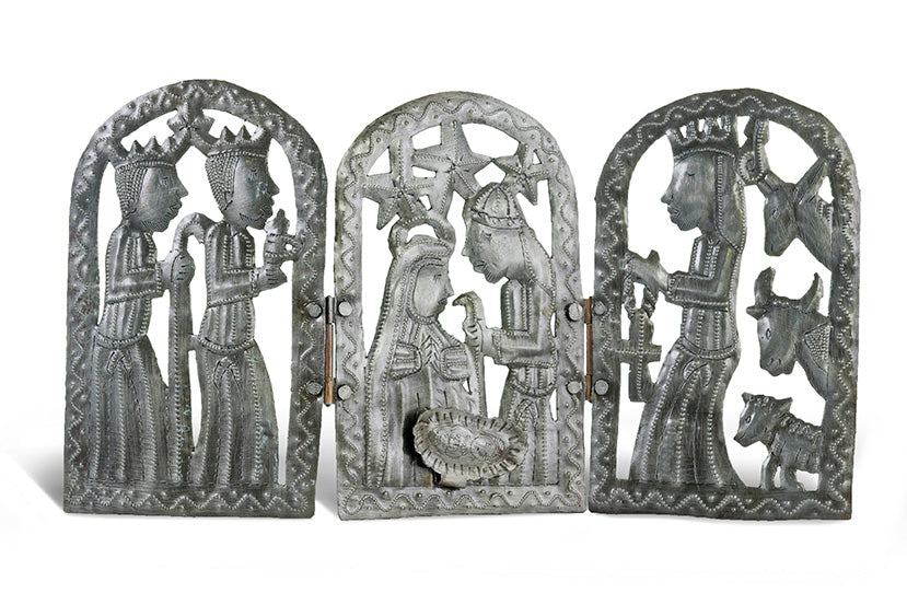 Three metal carvings of religious figures with intricate designs on a white background