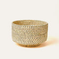 Woven basket with a textured pattern on a light background