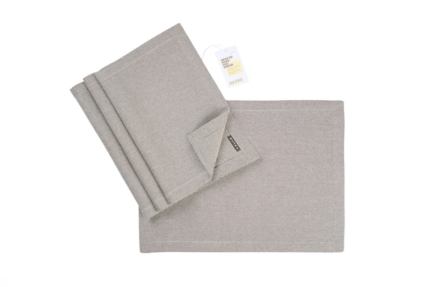 Gray striped cloth napkin set with a tag on a white background