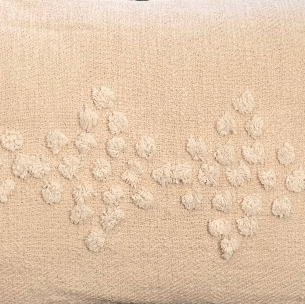 Beige fabric with floral embroidery pattern