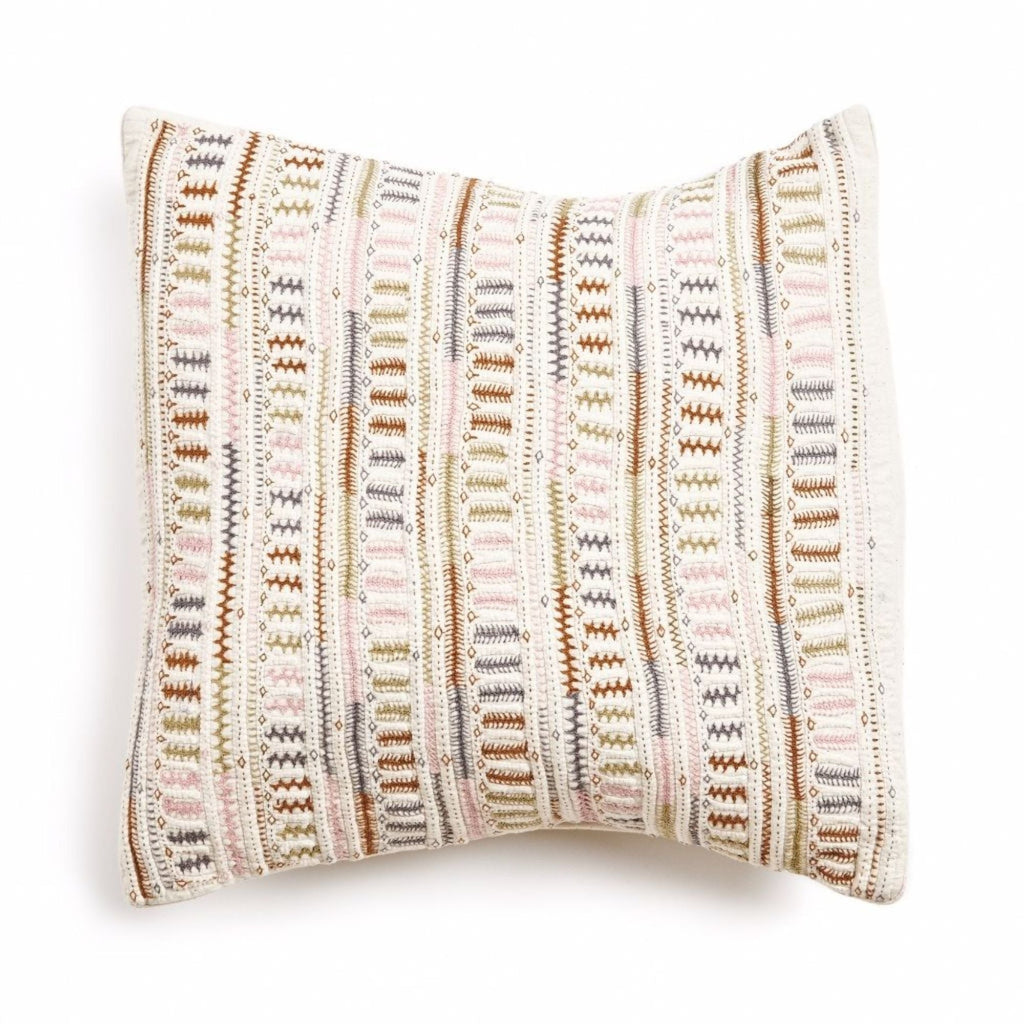 Decorative pillow with a striped pattern on a white background