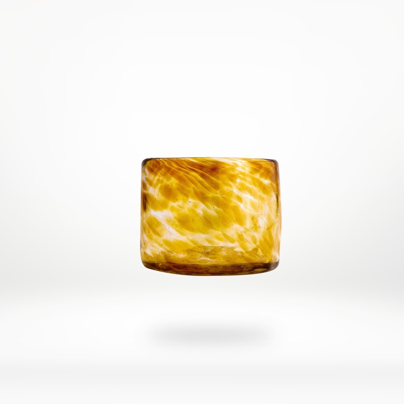 brown/gold marbled glass on a white background