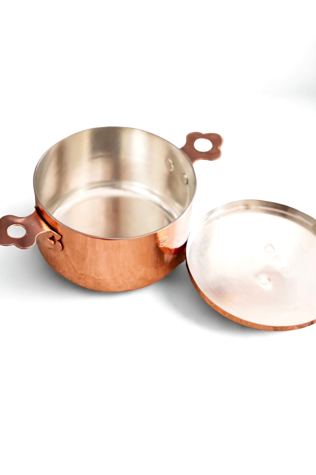 Copper pot on a white background