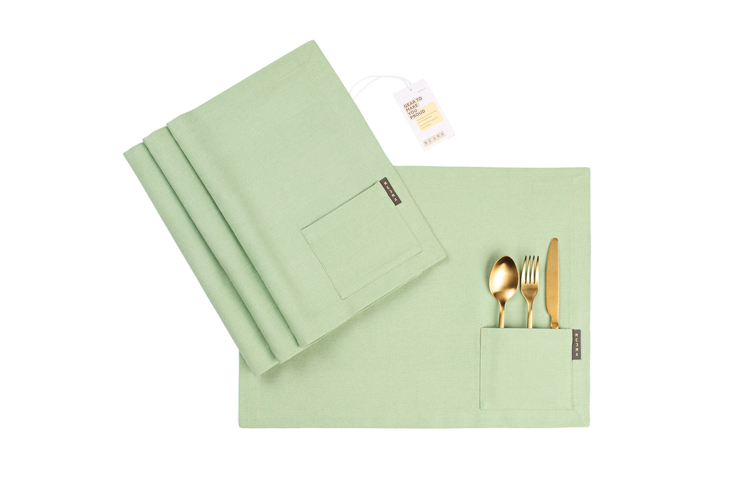 Green napkin/placemat with cutlery on a white background